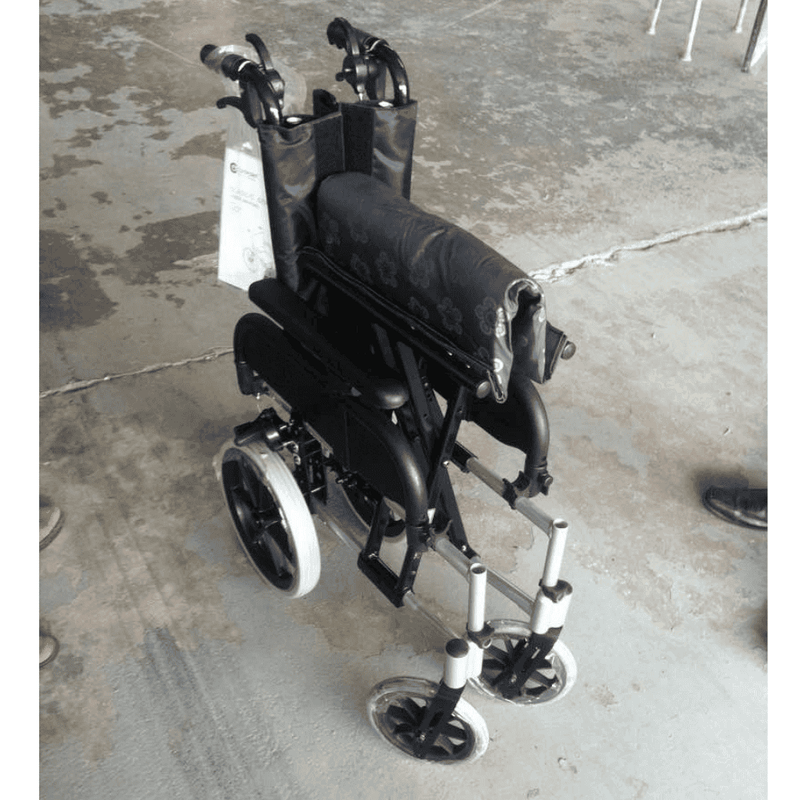 Black Flower Pattern Comfort Evolution Recliner Pushchair / Wheelchair - Asian Integrated Medical Sdn Bhd (ielder.asia)